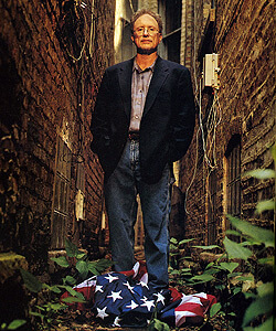 bill_ayers_on_flag Terrorist Bill Ayers standing on the American flag