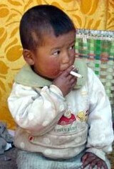 Patriotic Chinese child doing his part to boost his nation's economy.