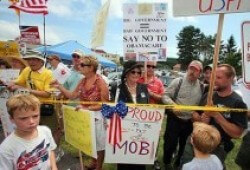 Town hal protesters Devilishly clever Nazis disguised as average Americans at a recent Town Hall meeting
